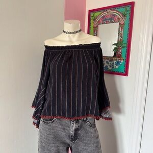 Shyanne Striped Flowy Off Shoulder Top With Flared Sleeves And Tassel Trim